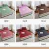 Six variations of a waterproof mattress protector with elastic straps in various colors including green, pink, brown, red, an