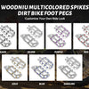A collection of multicolored aluminum dirt bike foot pegs in black, silver, purple, red, gold, blue, and dazzling colors.