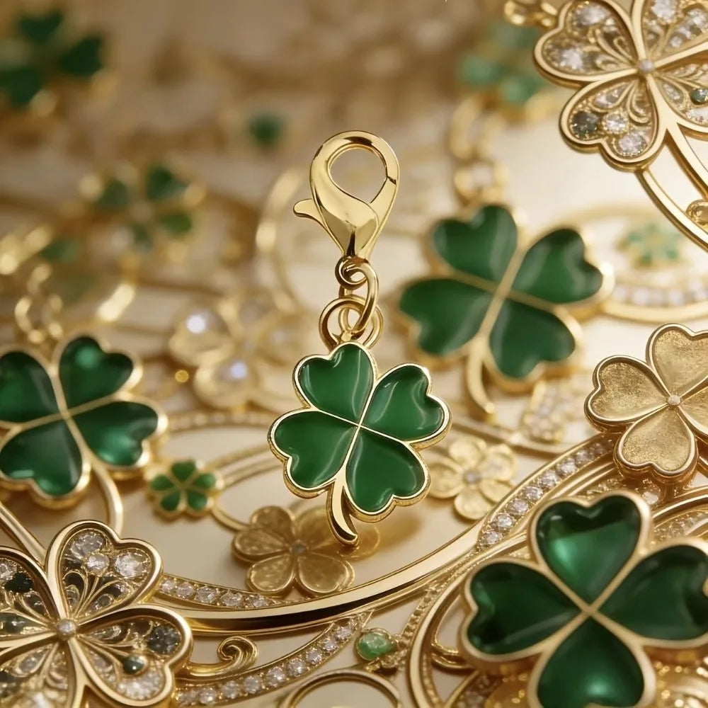 Gold and green clover leaf keychain charm with sparkling accents