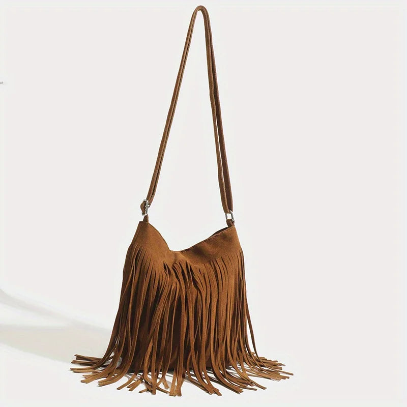 A brown bohemian fringe shoulder bag with long tassels hanging from a strap.