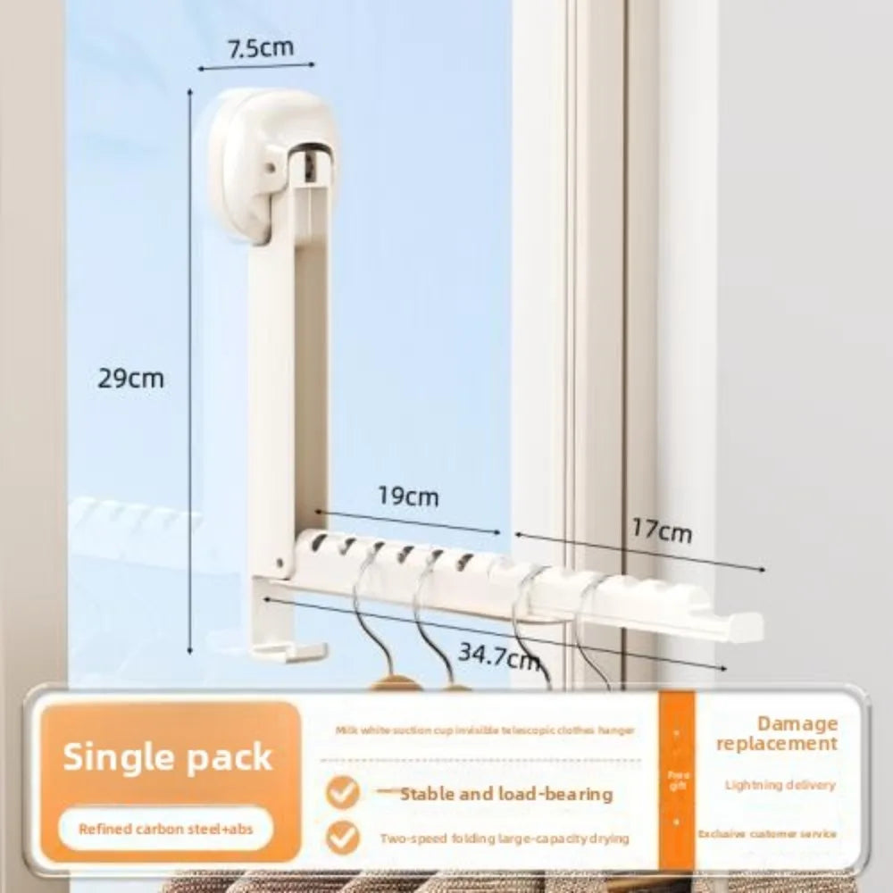 A white foldable wall-mounted clothes drying rack with an adhesive mount shown against a light blue background.