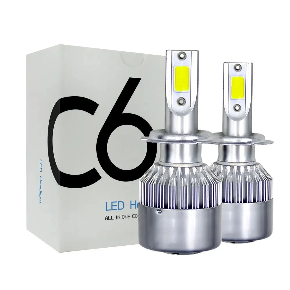 A pair of COB LED headlight bulbs in their packaging box.