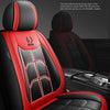 A close-up view of a black and red leather car seat cover featuring a three-dimensional design for abdominal muscle support.