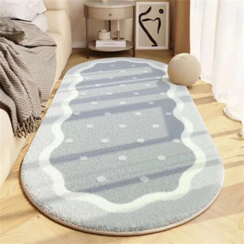 A light blue and white patterned plush area rug placed on a wooden floor.