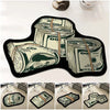 A black non-slip bathroom rug featuring a design of stacked US dollar bills.