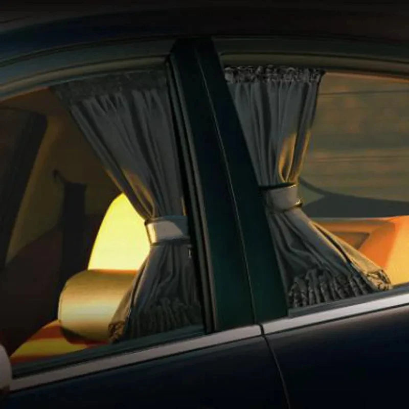 A close-up view of a folded car side window sun shade with UV protection inside a vehicle.