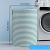 A tall, striped laundry basket with handles is shown next to a washing machine.