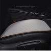 Close-up view of a gray breathable ice silk car seat cushion installed in a vehicle interior.
