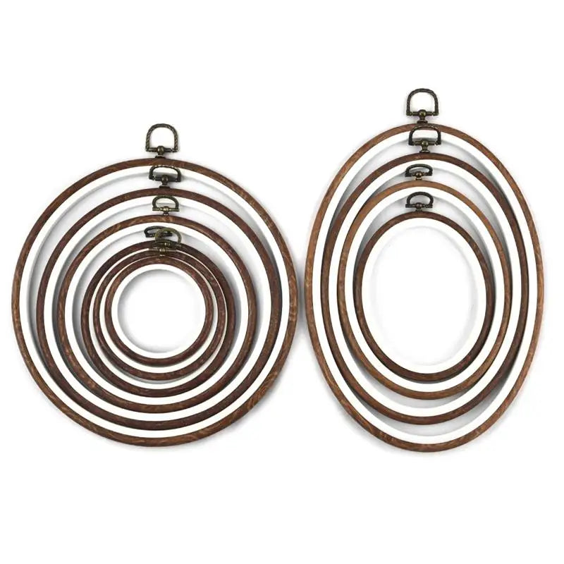 A set of six wooden embroidery hoops for cross-stitch and needlework