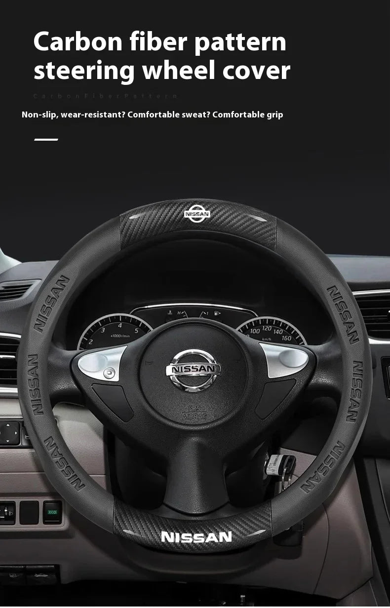 A black carbon fiber pattern steering wheel cover for a Nissan vehicle.