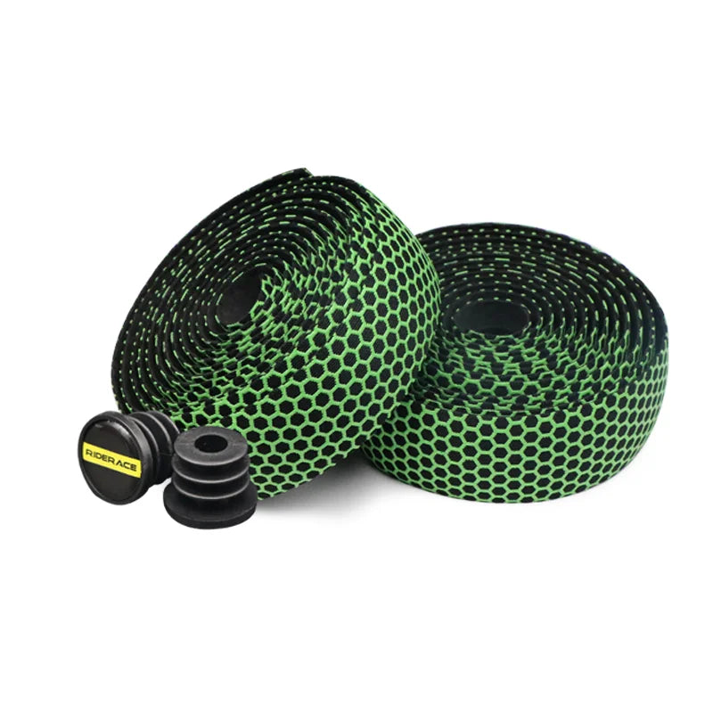 Two rolls of black silica gel handlebar tape with a green honeycomb pattern