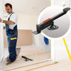 A man is using a heavy-duty steel door lift tool for installation in a room.