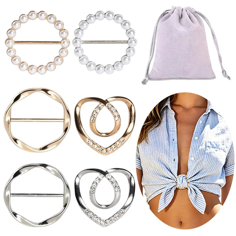 A set of metal scarf ring clips and a lavender fabric pouch for fashion accessories.