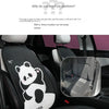 A black car seat cover featuring a white panda design and headrest pillows installed in a vehicle interior.