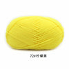 A ball of bright yellow 4-ply milk cotton yarn for knitting and crochet.