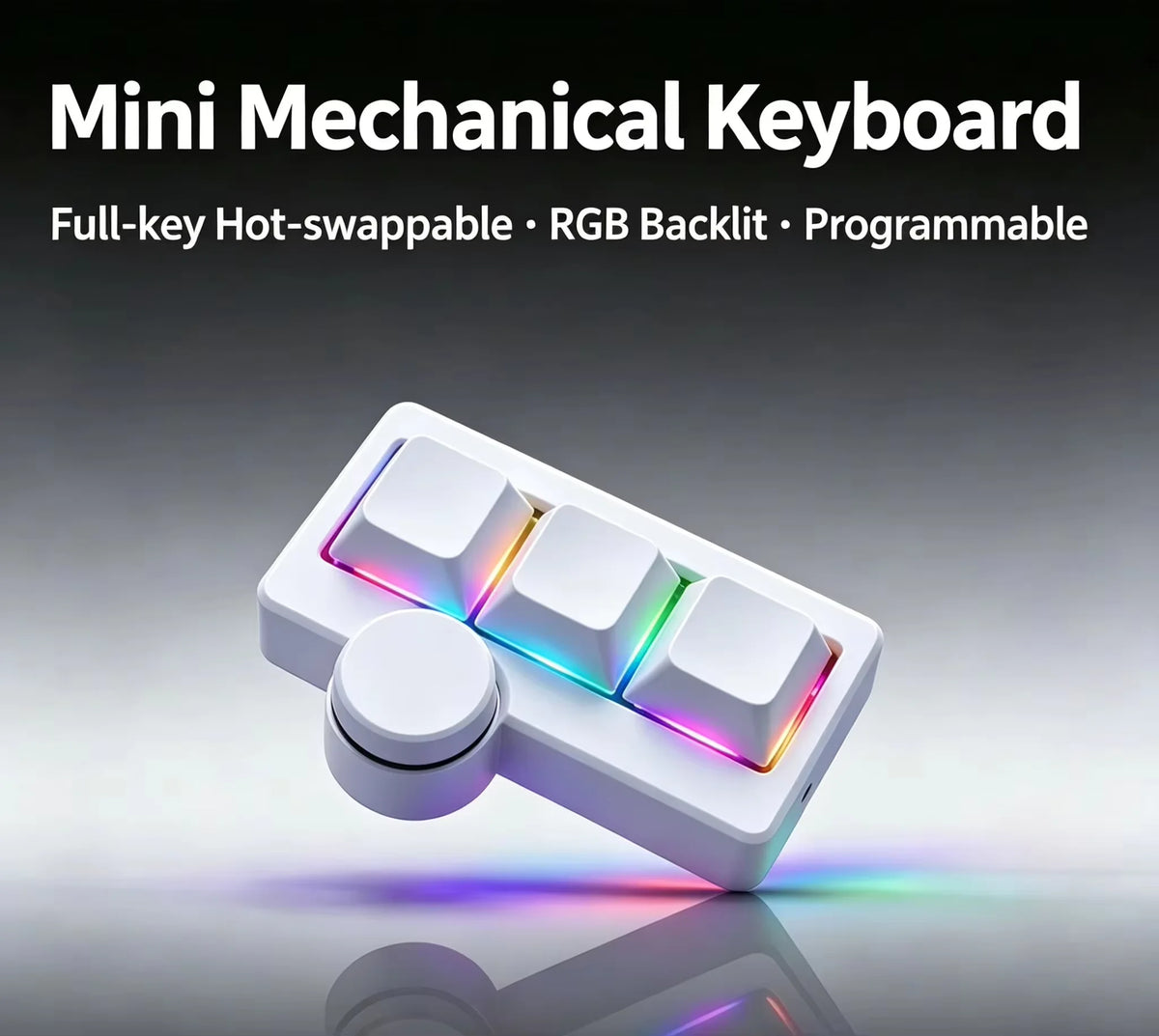 A white mini mechanical keyboard with RGB backlight and a round knob is shown on a reflective surface.