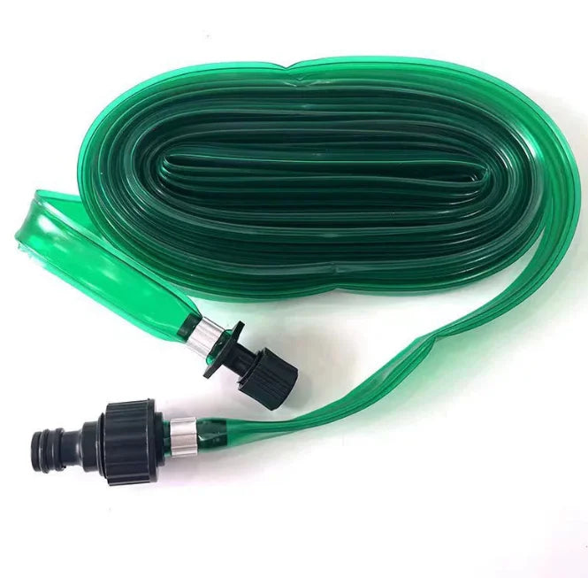 Green flat soaker hose with a rain-like spray nozzle for watering lawns and gardens