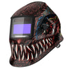 A dark, metallic welding helmet featuring a fierce, textured design with a large viewing window.