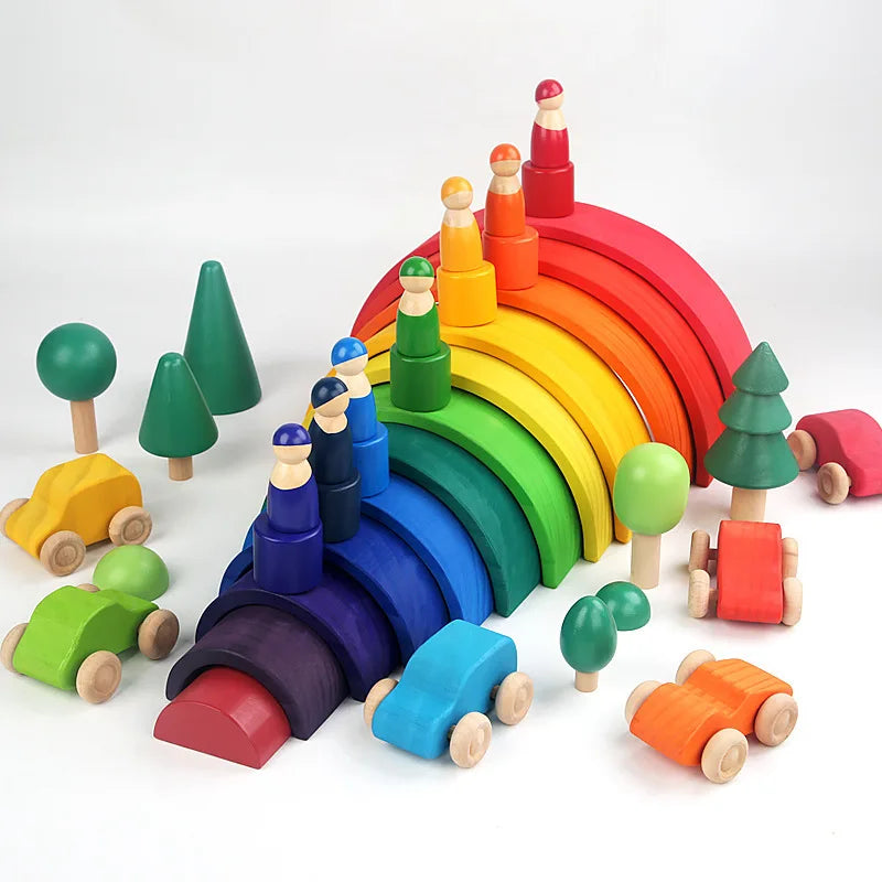 A colorful wooden rainbow stacking block set featuring various colored cones and triangles.
