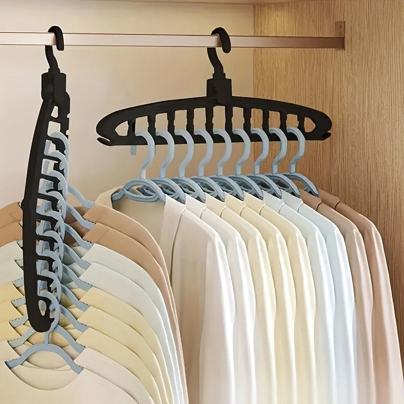 A display of multi-layer space-saving closet organizer hangers in various neutral and light colors.