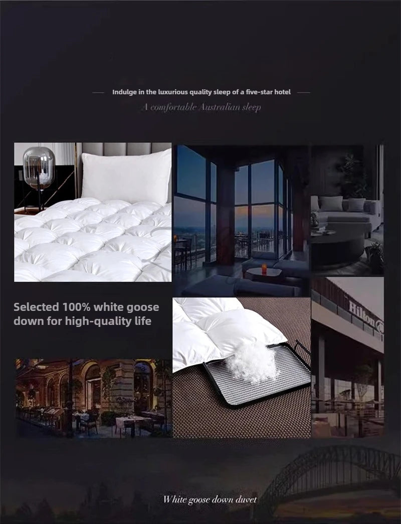 A white goose down duvet and pillows displayed in a luxurious hotel bedroom setting.