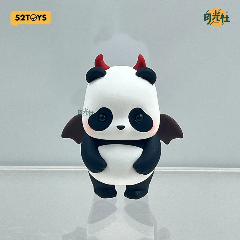 A white and black panda blind box figure with red accents is displayed against a light gray background.