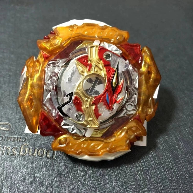 A metal battle spinning top featuring gold and red accents with a clear center.