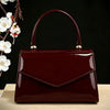 Vintage-Inspired Glossy Evening Handbag