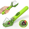 A hand holds a bright green eco-friendly bug catcher and magnifying viewer for kids, showing a small insect.