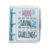 A clear plastic binder for a cash savings challenge with envelope storage and a blue circular item.