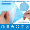 A hand demonstrates the layered structure of a waterproof disposable toilet seat cover, showing raw wood pulp paper and a wat