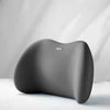 A gray memory foam car headrest and lumbar support pillow set resting on a white surface.