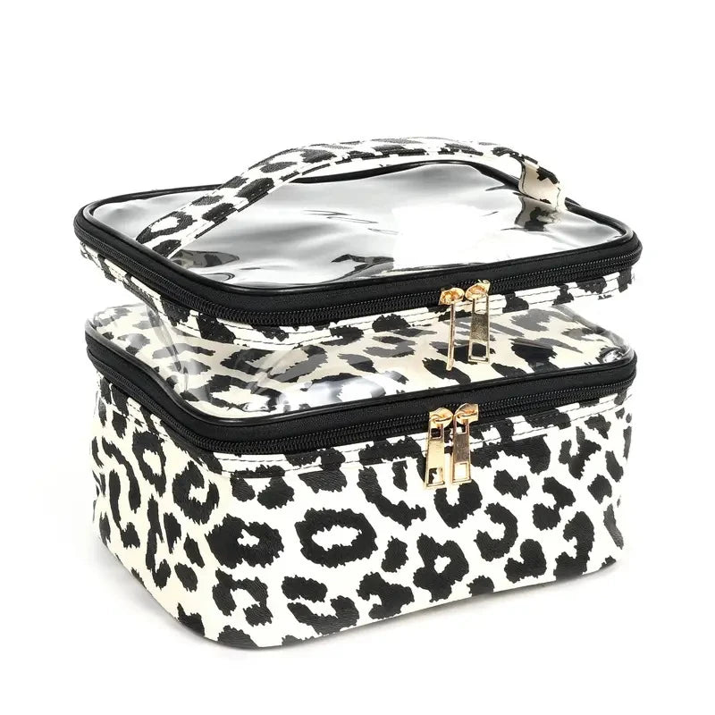 A leopard print transparent double-layer makeup bag with a black lining and gold hardware.
