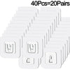 A set of 40 invisible adhesive wall hooks, packaged as 20 pairs, shown in white.