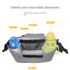 A gray storage bag for a stroller featuring a cup holder and various compartments for organization.