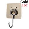 Gold self-adhesive rotating wall hooks for storage, featuring a metal hook and a curved handle.