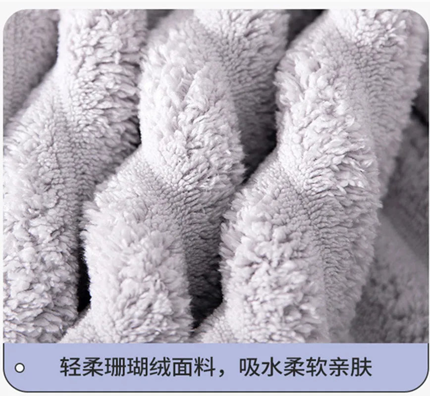 Close-up view of a fluffy gray microfiber towel texture.