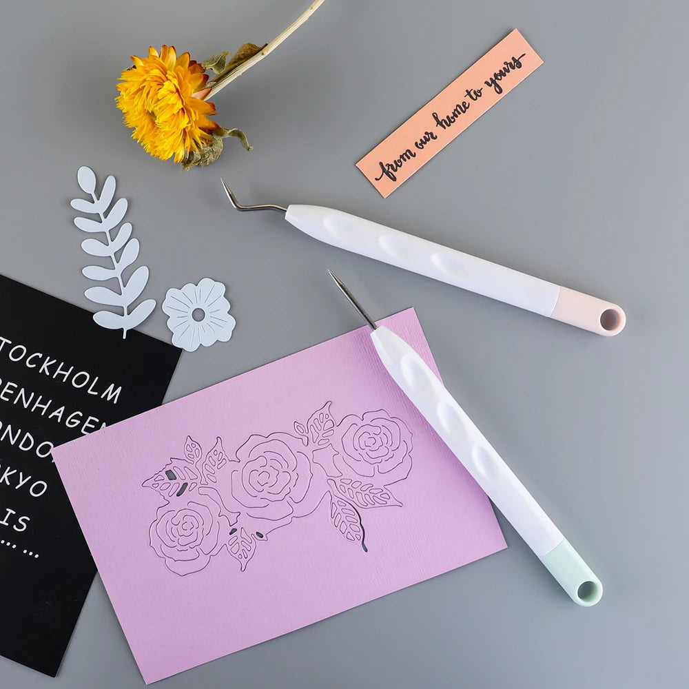 A set of six vinyl weeding and craft tools, including tweezers and other precision instruments, laid on a gray surface.