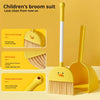 Yellow children's broom and dustpan set with a handle and bristles for cleaning