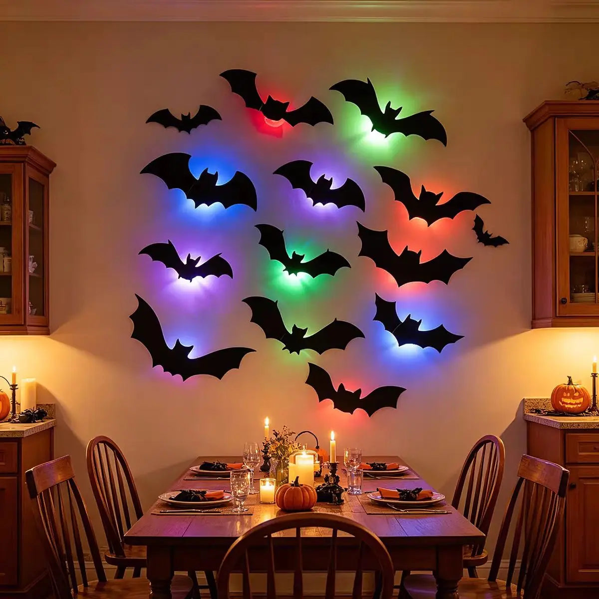 A wall display of black bat stickers illuminated by colorful LED lights in a dining room setting.
