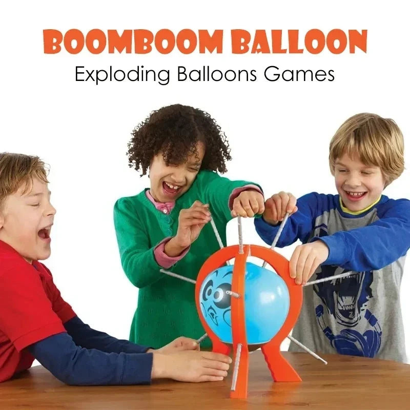 Three children playing with a Boomboom balloon game on a wooden table.