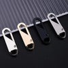 A set of eight universal metal zipper sliders in silver and gold colors displayed on a dark surface.