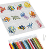 A cross stitch kit set featuring twelve colorful sea life designs on a gray fabric square with embroidery floss spools.
