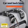 A pair of black car seat back hooks with a fold-away design are shown attached to a white storage container.
