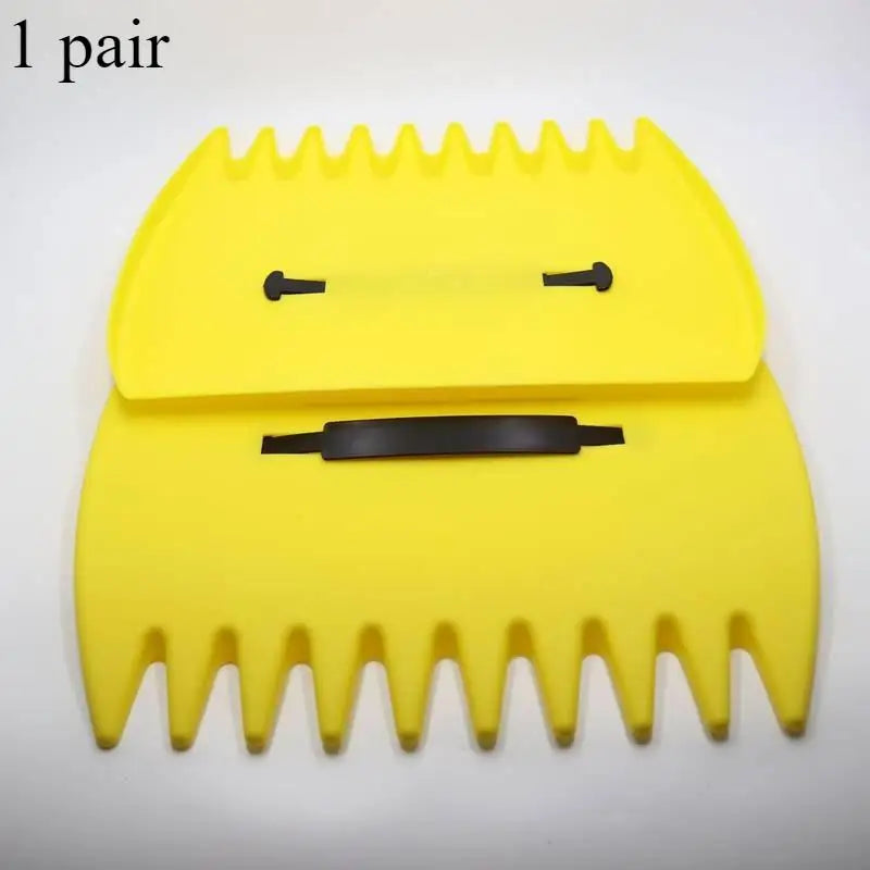 A pair of yellow ergonomic leaf grabber rake tools for garden use.