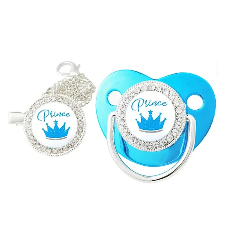 A set of crystal rhinestone pacifier chain clips with silicone nipples in blue and silver.