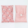 A pink soft cotton baby pillowcase featuring a repeating cartoon bunny design.