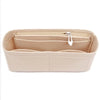 A beige soft felt handbag organizer insert with multiple pockets and a zipper.