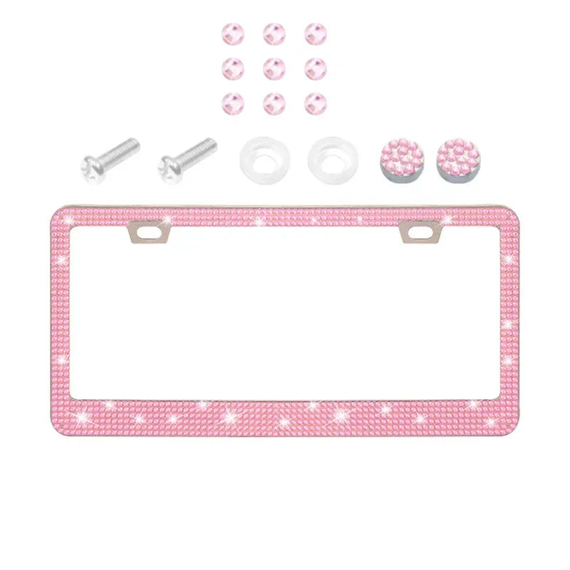 A set of crystal rhinestone license plate frames and mounting hardware for cars.