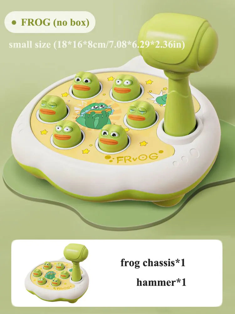 A small green frog toy with multiple eggs, a hammer, and a frog chassis are shown on a green background.
